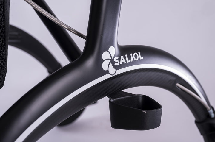 A close up of the Saljol logo on a matt back walker rollator