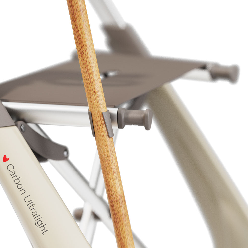 A close up of a cane holder attached to a byACRE ultralight walker