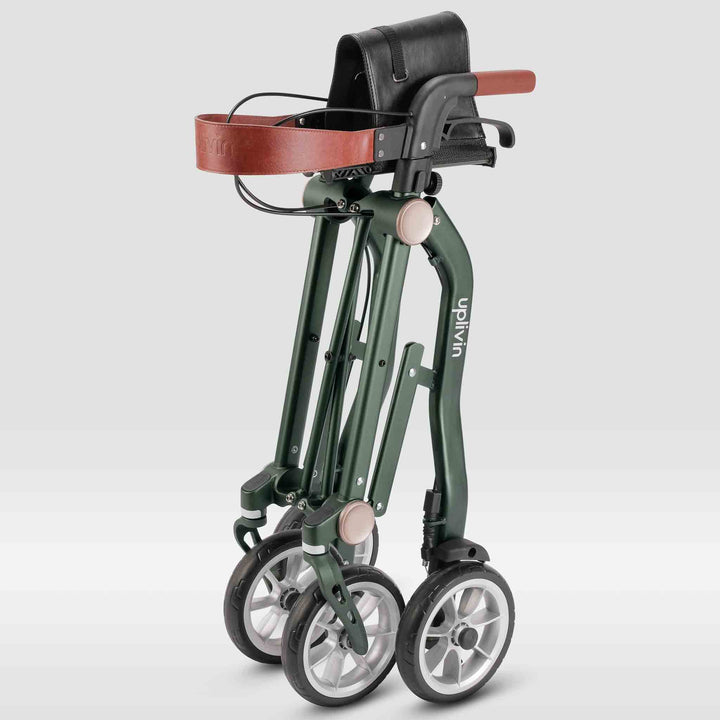 A green 'Uplivin Trive' rollator walking frame that is folded and on a white background.