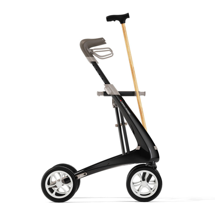 A byACRE Carbon Ultralight rollator with a walking cane attached on a white background