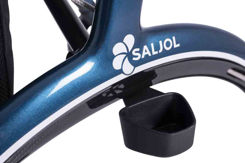 a close up of a cane holder attached to a carbon fibre Saljol rollator on a white background
