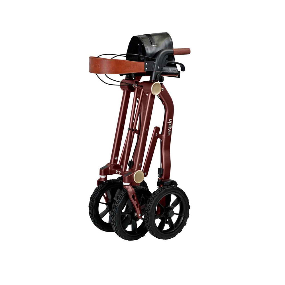 Light weight mobility walker that is folded on a white background